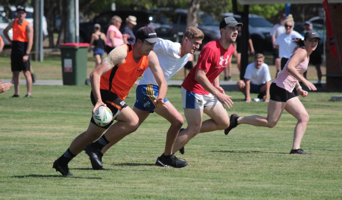 On the run: Teams came together for the annual Camden Haven Charity Touch day.