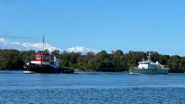 The patrol boat from Tonga was towed along the Hastings River for recycling at Birdon Marine. Photo: Ben Harvey.