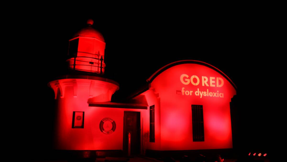 Tacking Point lighthouse will be among several locations across the Hastings to Go Red for Dyslexia on Friday, October 15. Photo: dyslexiamnc.org.au