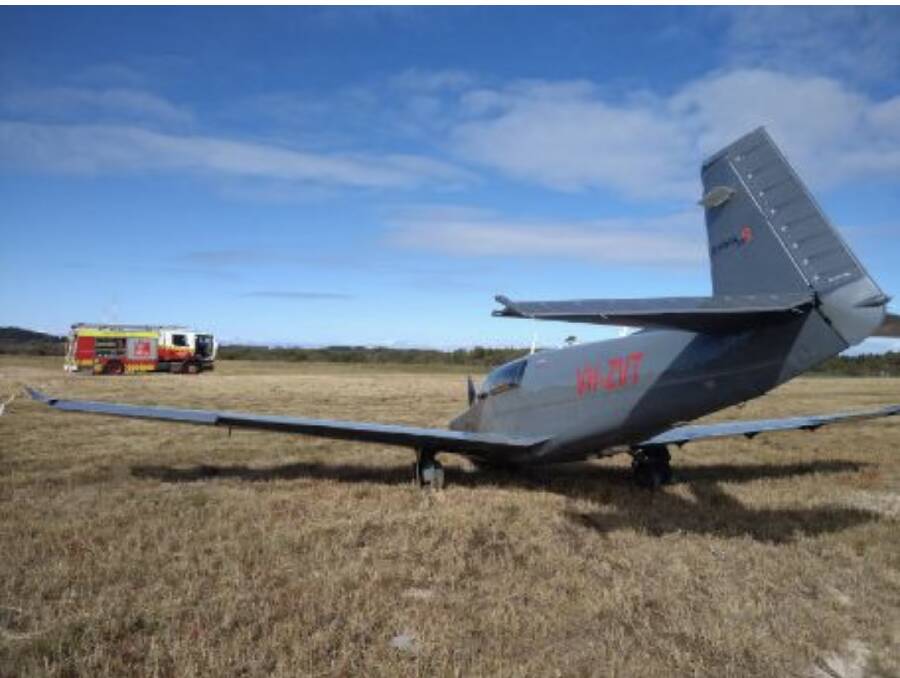 The light aircraft came to a stop off the runway at Port Macquarie Airport. No-one was injured. Photo: Fire and Rescue NSW.