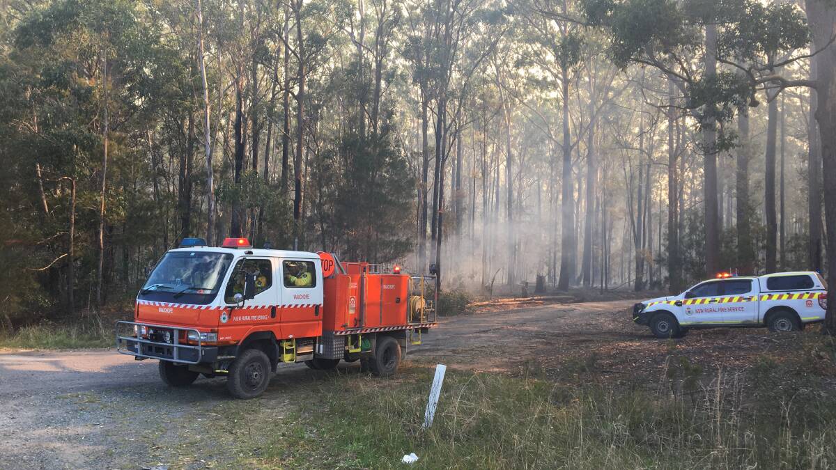 Rural Fire Brigade crews were managing the fire on Sunday afternoon. Photo: Tracey Fairhurst.