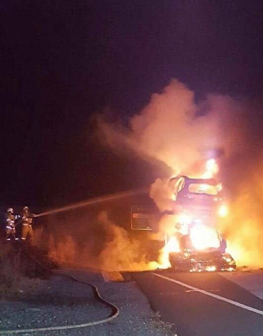 The truck carrying new motor vehciles on fire. Photo: Sancrox Thrumster Rural Fire Service.