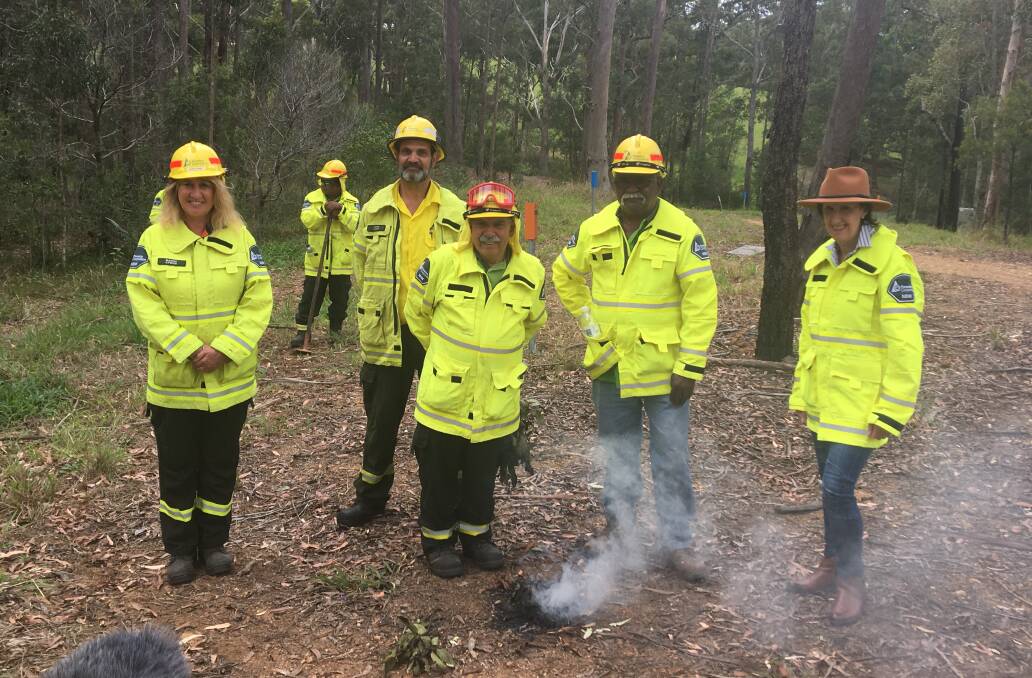 Partnership: Senior manager for forestry stewardship Kathy Lyon, John Shipp, Uncle Bill O'Brien, Amos Donvovan and Port Macquarie MP Leslie Williams.