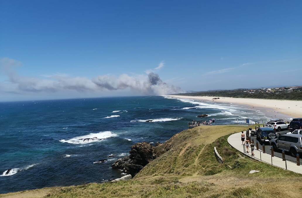 The view of the 60 hectare fire south of Port Macquarie from Tacking Point lighthouse. Photo: Leigh Mansfield.