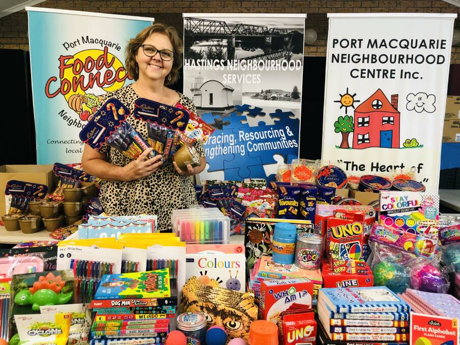 Port Macquarie Neighbourhood Centre coordinator Julie Trowbridge with the donated items.