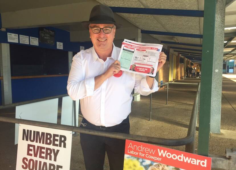 On the campaign trail: Labor candidate Andrew Woodward began his election day campaign in Port Macquarie. Photo: Lisa Tisdell.