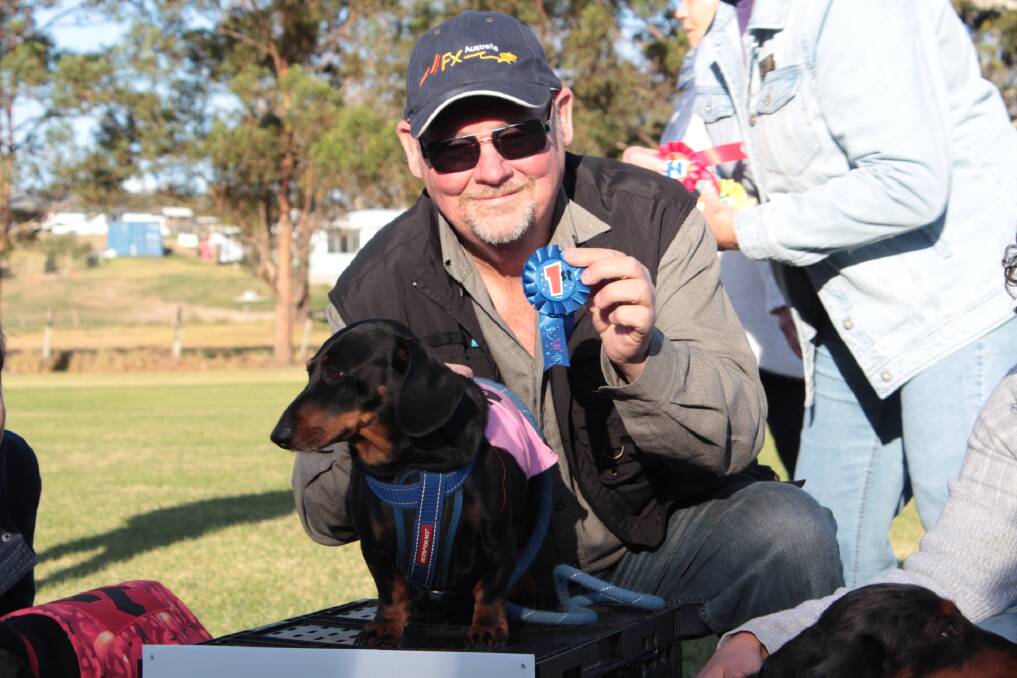 Dashing Dachshund: David Graham of Wauchope with speedy Benny who took out the inaugural Sossie Slipper.