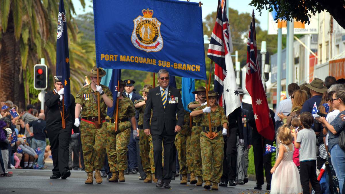 Port Macquarie RSL sub-Branch president Greg Laird leads the way at the 2018 Anzac Day march along Horton Street.