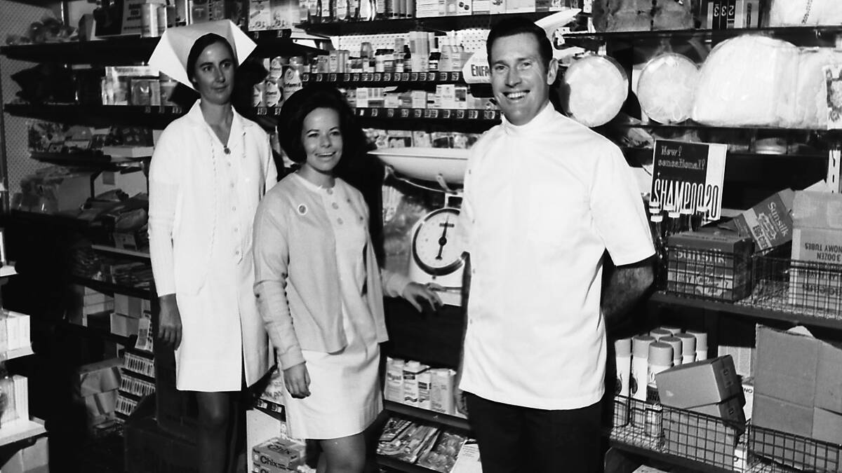 Mrs Baker, Mrs Penny Hesse and Chemist, Kevin Baker in his new Horton Street store, 1969.