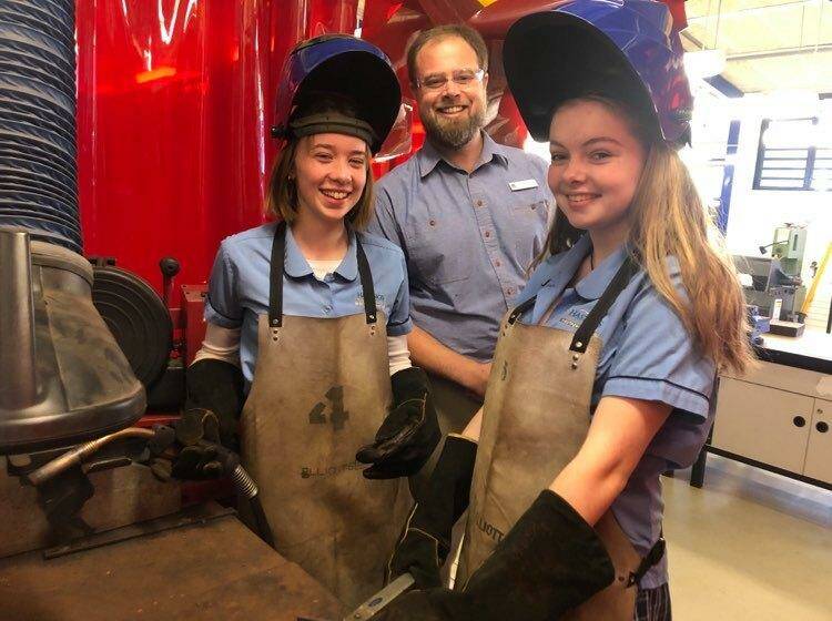 Grant Weatherby, Senior Pathways Advisor and Public Schools NSW Tamworth RTO manager with Hastings Secondary College students Chloe Warren and Charlotte Starr.