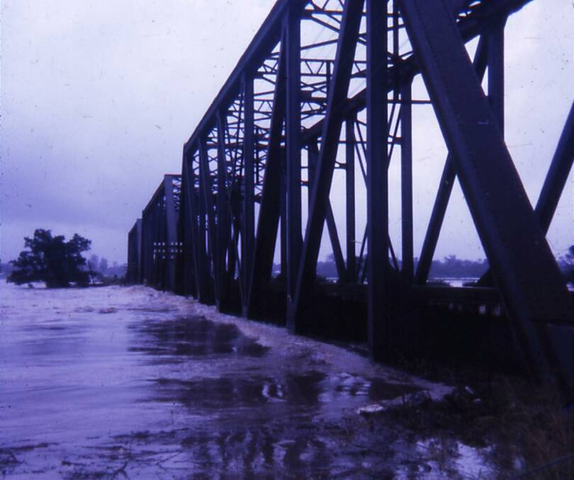 The Hastings River rushing over the bridge at Wauchope during the 1968 floods. Photo: Tracey Thorn.