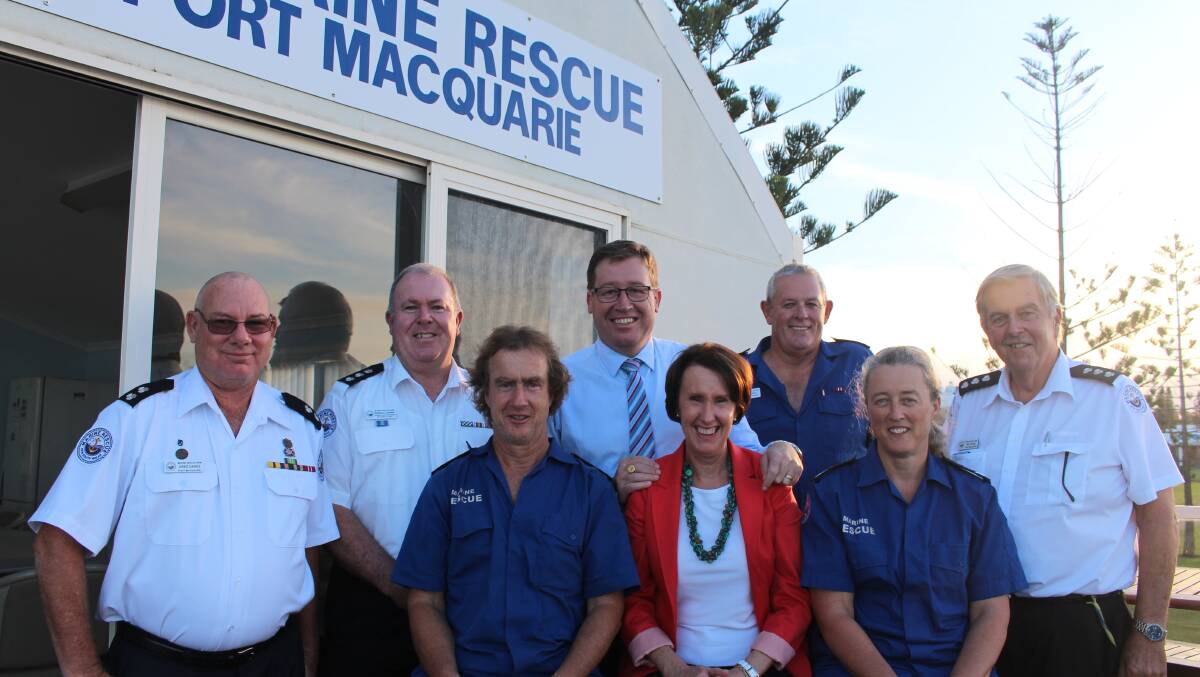 Grant received: Member for Port Macquarie Leslie Williams and Minister Troy Grant with members of the Port Macquarie Marine Rescue service.