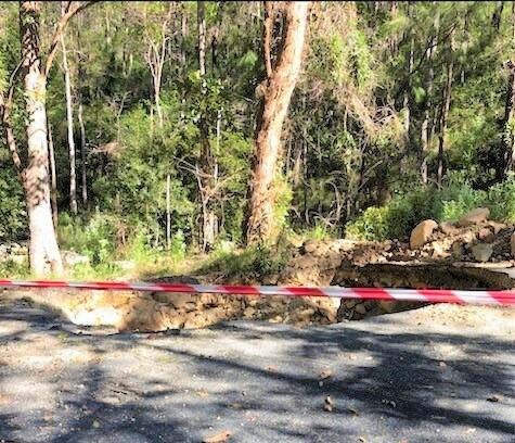 One of the massive sink holes on the road up North Brother mountain. Photo: PMHC.