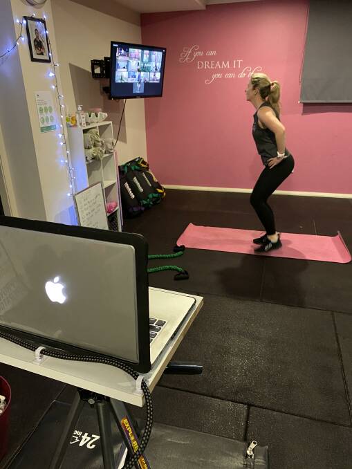 Rachel Leman leads a virtual workout.