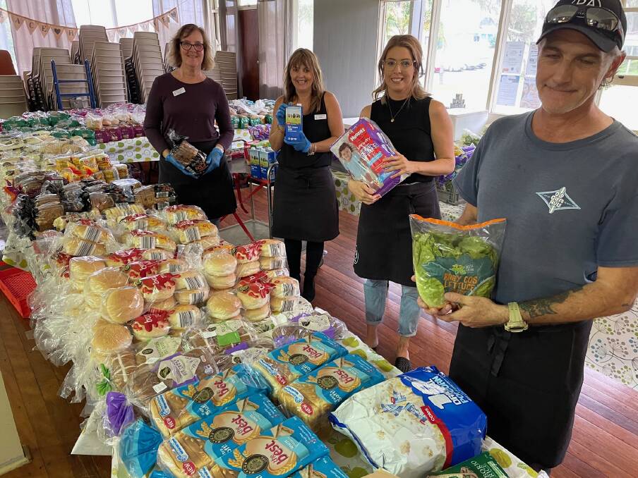 Food for the soul: Port Anglican Soup Kitchen volunteers Shirley Thompson, Kristie Arnold, Kerri Attenborough-Bourke and Robbie Topham withe the food donations.