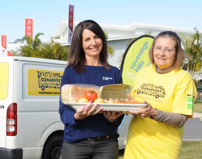Making a difference: Sovereign Hills Nicole Landy with OzHarvest Port Macquarie's Linda Brettell.