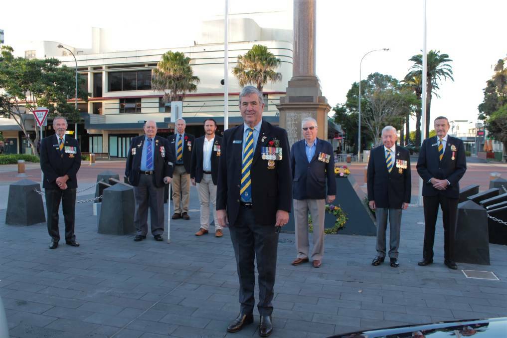 Port Macquarie RSL sub-Branch president Greg Laird at the cenotaph with fellow ex-servicemen in 2020. Photo: Tracey Fairhurst.