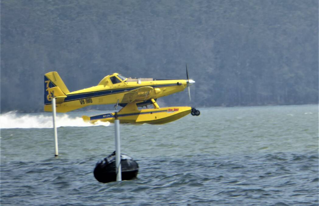 Firebombing seaplane on Queens Lake. Photo: Ron Chapman.