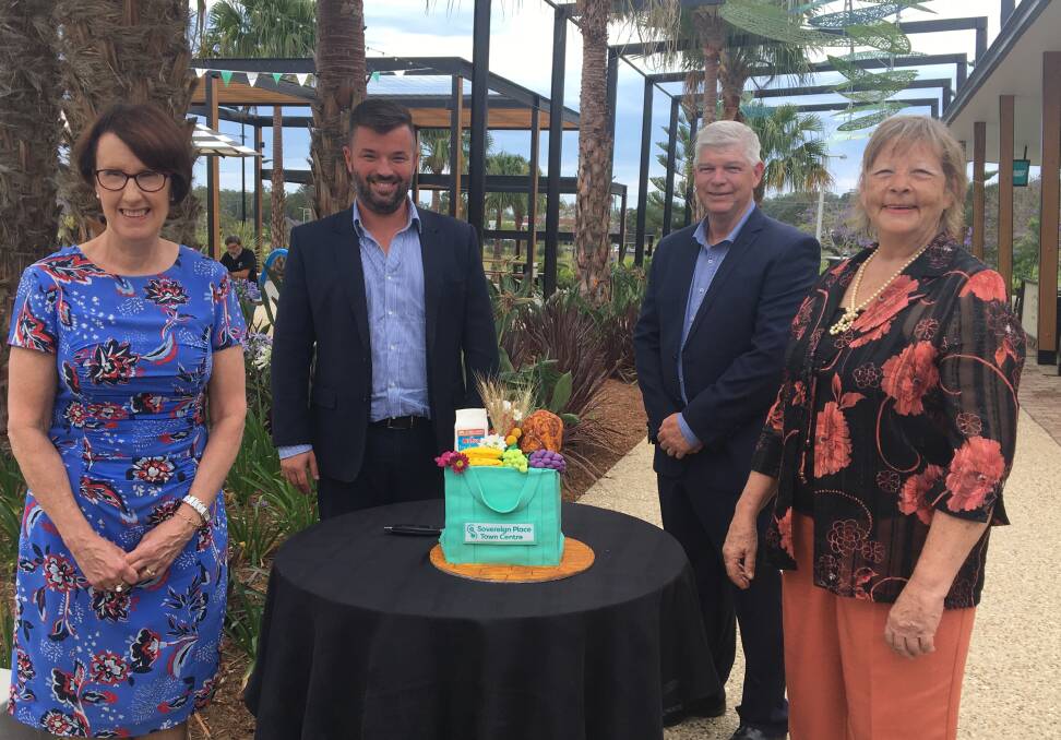 One year on: Port Macquarie MP Leslie Williams, Matthew McCarron CEO Lewis Land Group, Hastings Co-op CEO Alan Gordon and Cr Lisa Intemann.