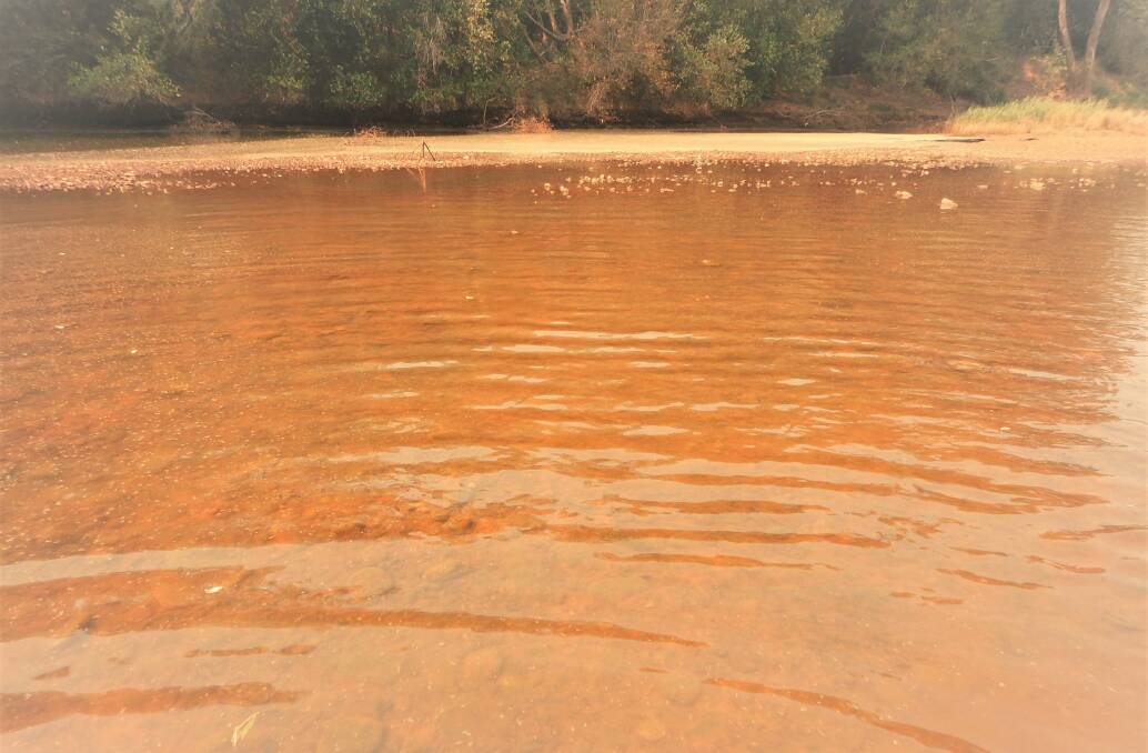 Leaching mean the river runs red with iron deposits. This severe reddening area was recorded upstream of Bains Bridge.