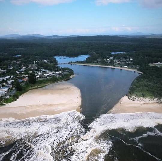 An aerial shot of Lake Cathie in early January when it was released to the ocean. Photo: Dean Pavy, Saving Lake Cathie.