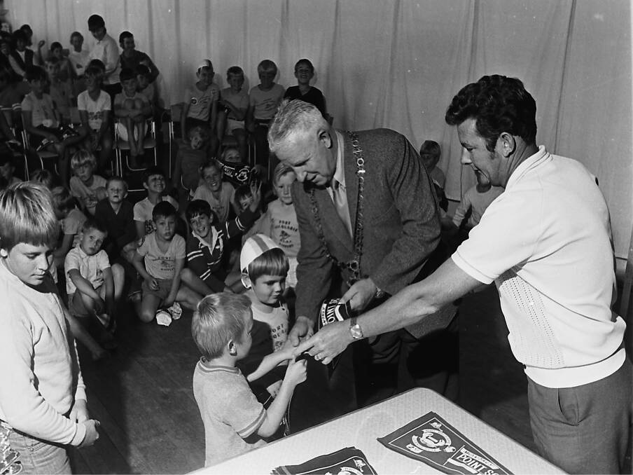 Mayor, Ald. D. S. Kennedy and Club President present trophies to two young nippers, 1971