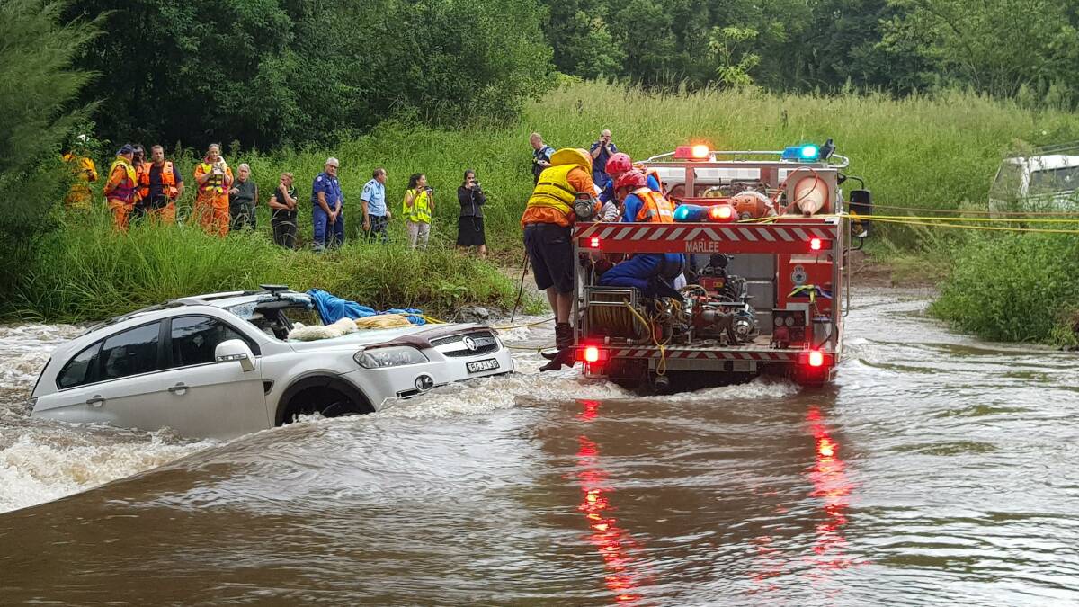Rescued: Two women were caught on a flooded causeway at Bobin. Photo by: Sandra Zielke.