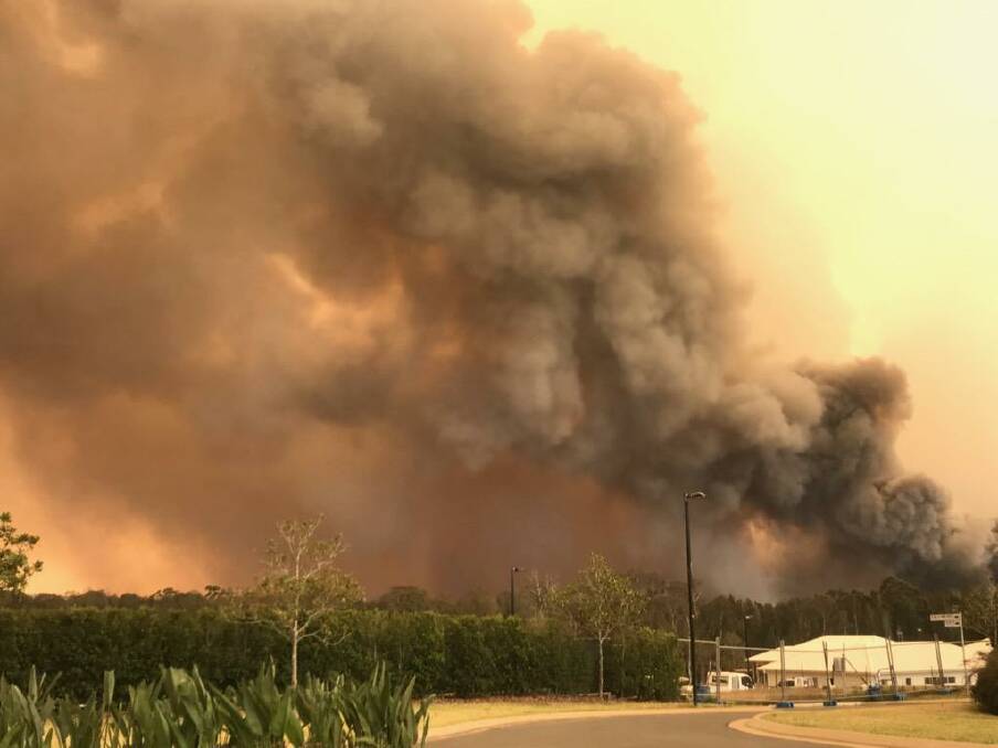 Terrifying scene: Ocean Club Resort faces the brunt of the fire storm on Tuesday at Lake Cathie. Photo: Ocean Club Resort.