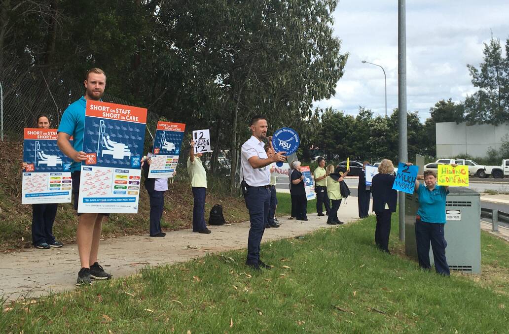 Health Services Union representatives and hospital workers hold a rally outside Port Macquarie Base Hospital on November 9.