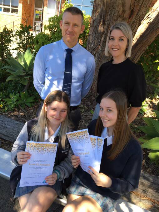 Hastings Secondary College Port Macquarie campus students Leah Elliott and Holly Lamont with year 12 advisers Damien Huens and Jacynta Moylan.