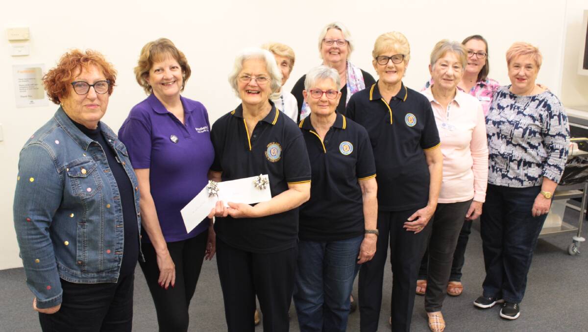 Special donation: Ann Stewart, Jenny Watts, Gay Cowan and Gail Hassall with CWA members.