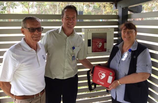 Life saving: Port Macquarie Golf Club director Tony Hayward with Port Macquarie Provate Hospital representatives David Moore-Jones and Kim Patrick.