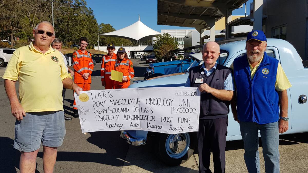 Ron Rocket Turnbull and HARS President Chris Whalley with Cancer Care Coordinator Ken Procter, and (back) Race Club CEO Michael Bowman and SES volunteers Jared Bradley and Phil and Rose Johnson.