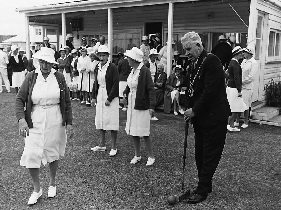 Mayor Stewart Kennedy prepares to make the first hoop at the Croquet Tournament, 1971