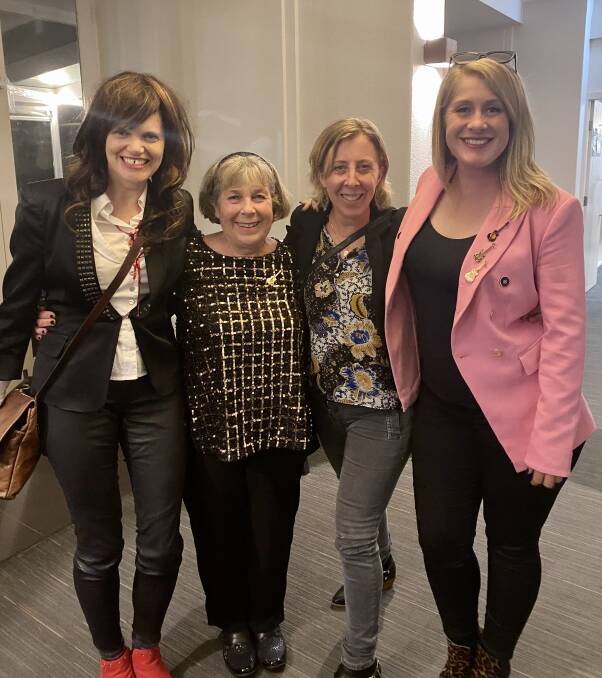 Anna Warren, Narelle Spooner, Jess Spooner, Zoe Spooner. Narelle set the tone with her black top and sequins as did daughter Zoe in a pink jacket which had mini guitar badges her father had brought back from overseas trips which invariably included visits to Hard Rock Cafes.
