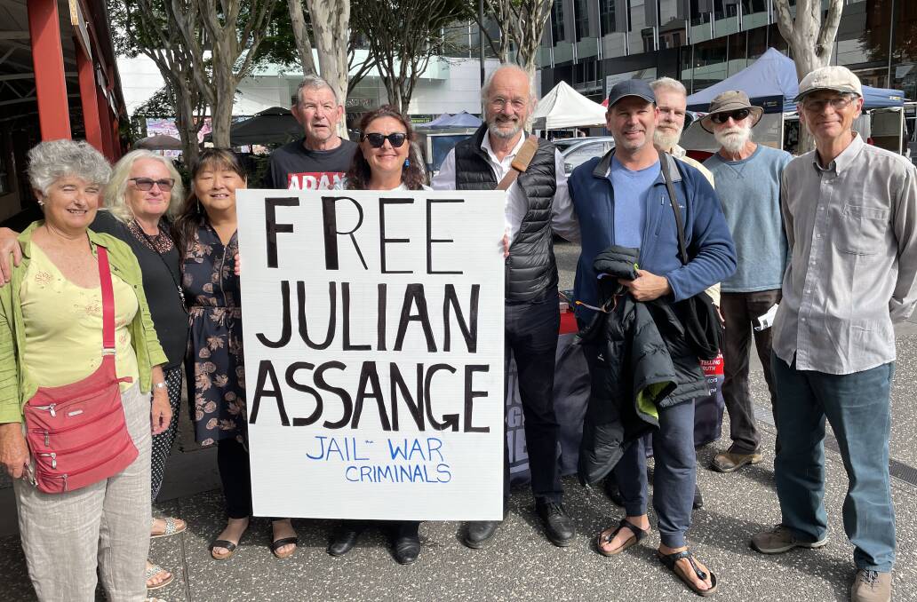 John Shipton (centre), father of incarcerated WikiLeaks founder Julian Assange, with supporters in Port Macquarie.