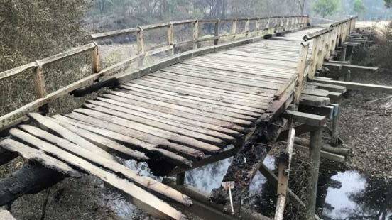 The Right Arm Road bridge at Pappinbarra was destroyed by fire with remediation works later washed away in floods.