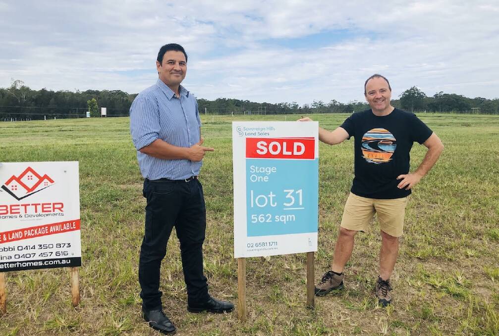 Sovereign Hills Land Sales Manager Luke Moreta with new land purchaser Malcolm McKinlay.