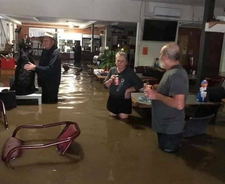 Devastated. Residents Vick and Mitch at Telegraph Point club after being rescued from floodwaters. A GoFundMe page has been set up to help the family rebuild after losing their home and possessions. Photo Kellie Morley.
