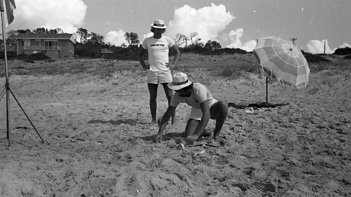 Mark Dingle and Norman Morgan setting up for the Lighthouse Beach patrol, 1972
