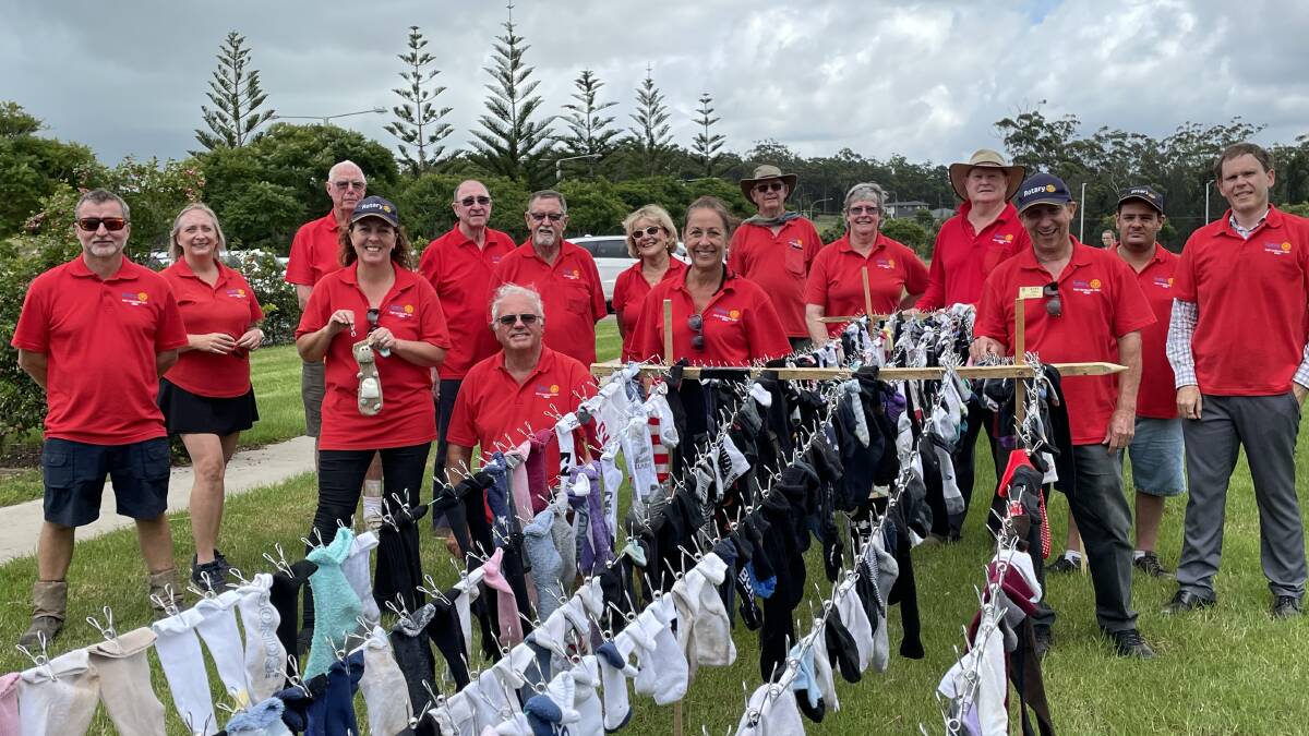 Rotary members get in some pegging practice in preparation for the June world record attempt.