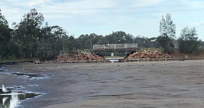 Drained: Many locals are critical of the bridge impeding the natural flow of the lake. This was taken in 2019 when the lake was near empty. Photo: Lisa Willows.