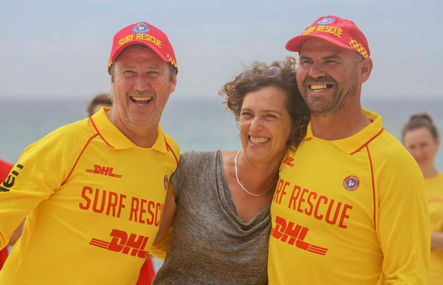 Reunited: Phil Traves, Samantha Morley and Tony Worton. The surf club champions were honoured for their rescue of the young mum. Photo: SLSNSW.