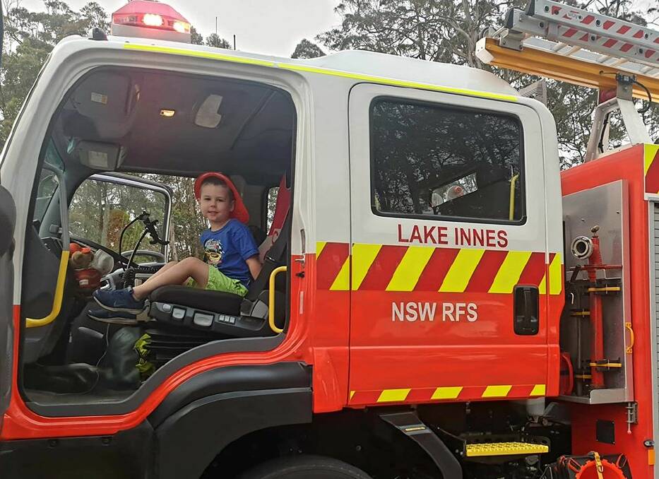 Good deed: Ayrton Ridding donated his pocket money to the Lake Innes RFS.