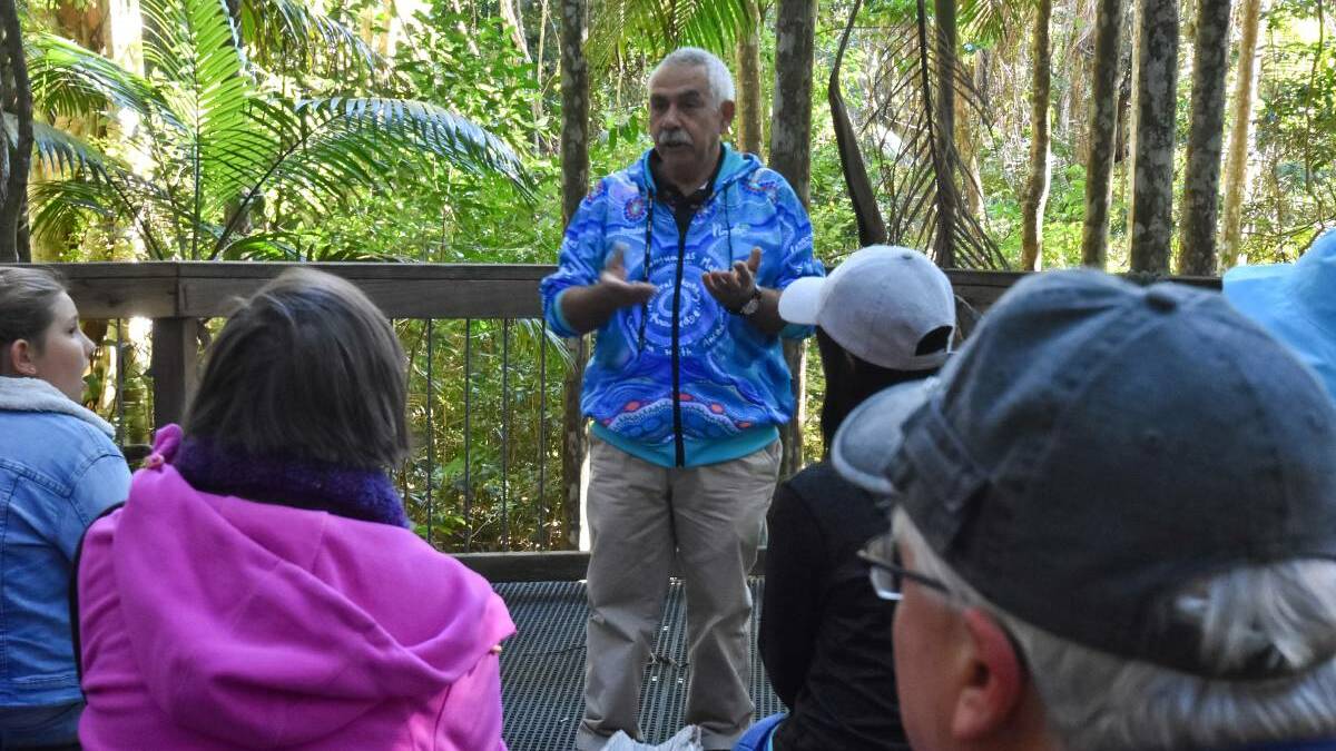 Uncle Bill O'Brien presenting to visitors at Sea Acres Rainforest Centre.