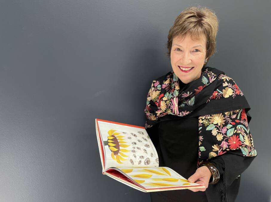 Unlocking potential: Former teacher and children's librarian Virginia Cox has been honoured with an Order of Australia Medal (OAM). Photo: Tracey Fairhurst.