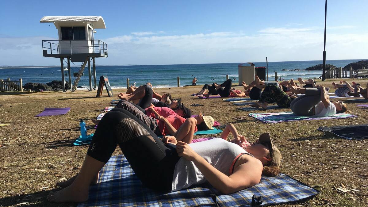 Beach yoga is back for a good cause