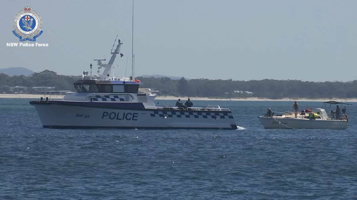 NSW Water Police delivers the yacht back to the harbour in Nelson Bay. Photo: NSW Police.