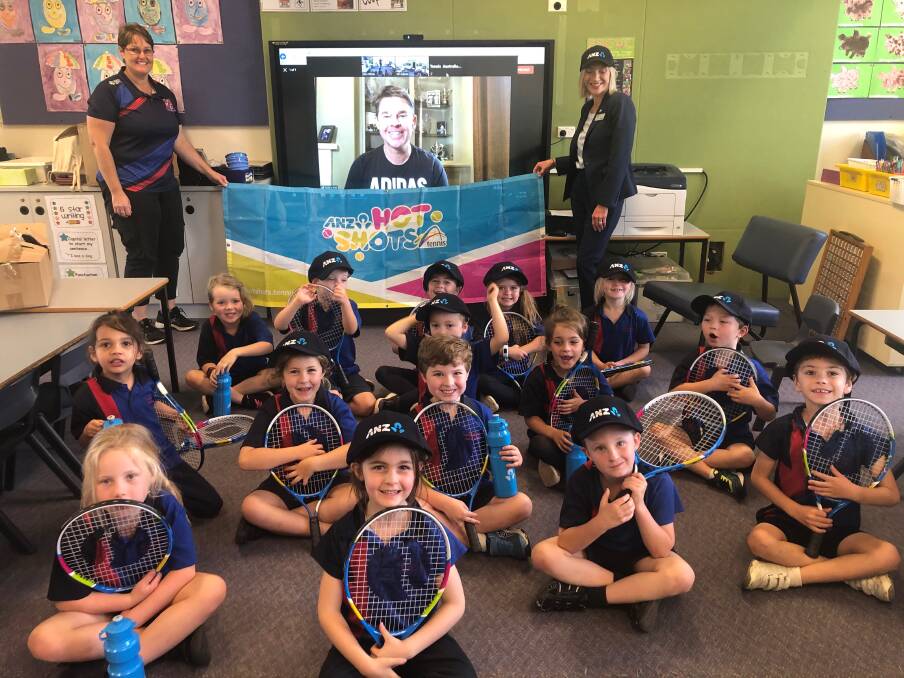 It's a hit: Telegraph Point Public School students with their new tennis racquets.