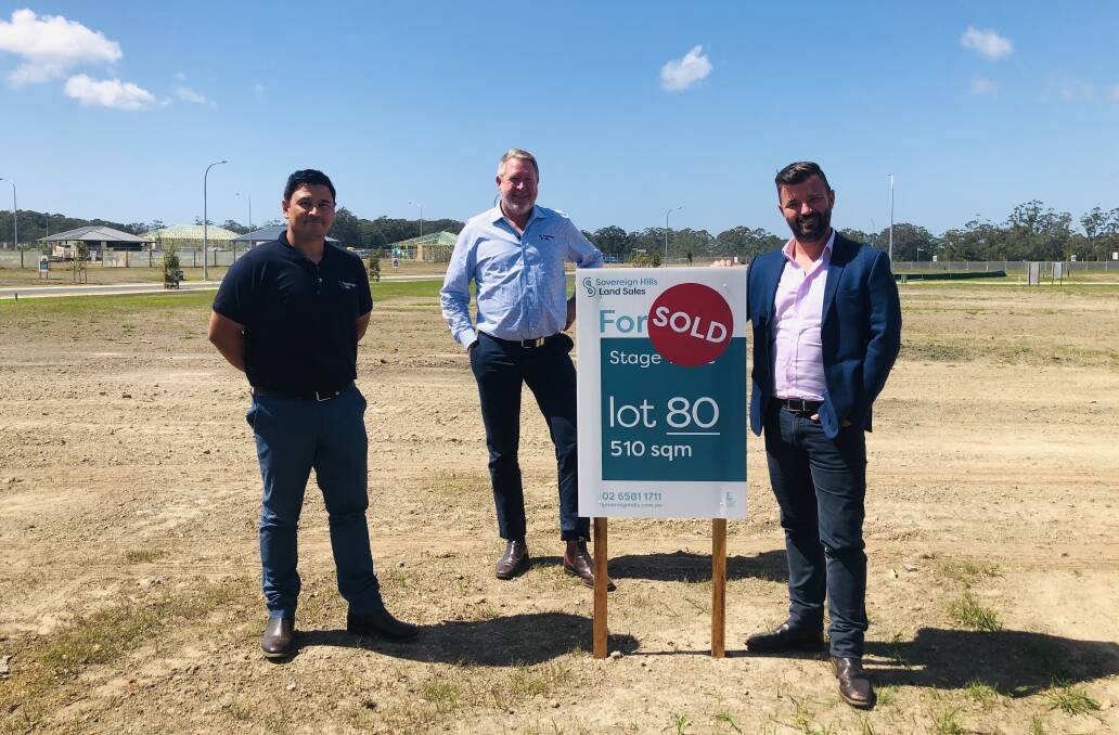 Snapped up: Lewis Land Group's Luke Moreta, Michael Long and Matthew McCarron at The Heritage in Sovereign Hills, Port Macquarie.
